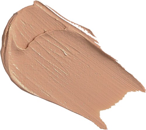 Dikke, beigekleurige crème of foundation uitgesmeerd op een witte achtergrond.