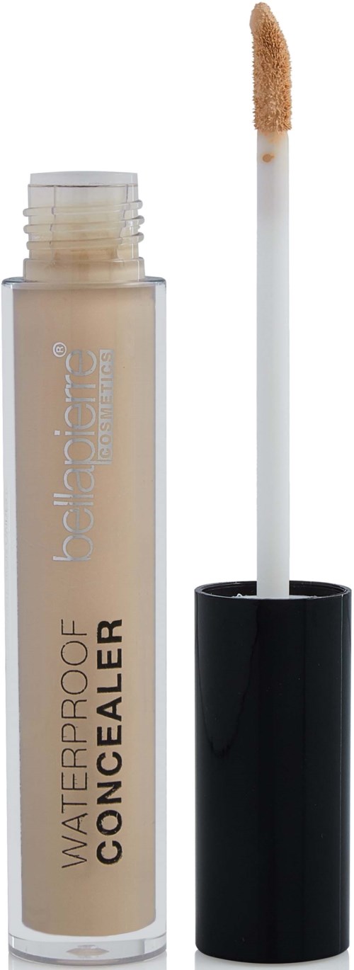 Ett concealer-rör med en applikator som visar en beige vätska inuti.
