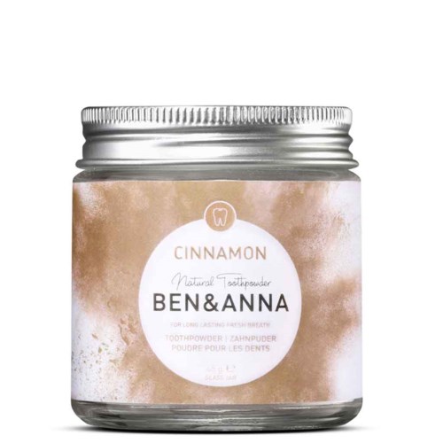 Een pot Ben & Anna kaneel tandenpoeder met een lichtbruin label en zilveren dop.
