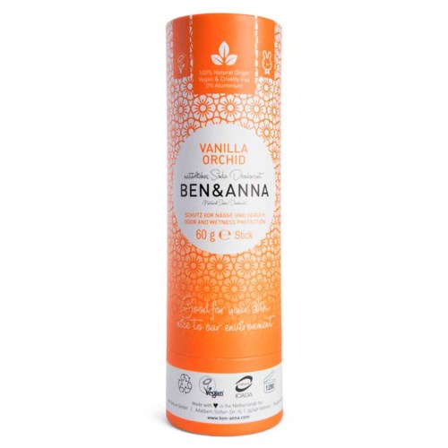 En cylindrisk förpackning med orange och vit design, märkt som vaniljorkidssmak, vegansk, naturlig och miljövänlig.
