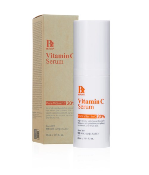 A white bottle and beige box label Vitamin C serum in simple packaging.
