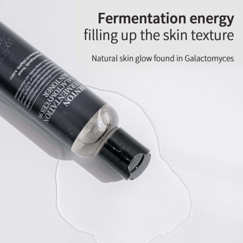 A skincare product with black packaging and a clear gel, emphasizing natural skin glow from Galactomyces fungi.