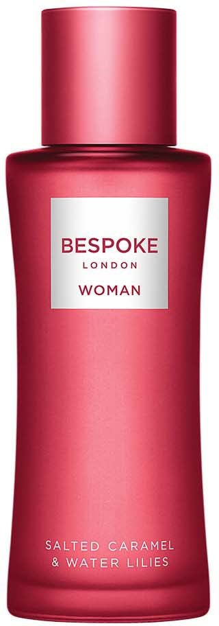 Red bottle with white label, says 'BESPOKE LONDON WOMAN' and 'Salted Caramel & Water Lilies'.