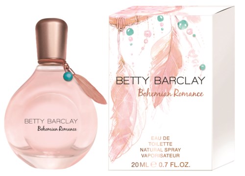 En rosa parfonsflaska med en box, dekorerad med en fjäder, pärlor och en etikett, kallad Bohemian Romance av Betty Barclay.