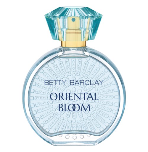 En parfymflaska med en ljusblå och guldkapsel, märkt 'Oriental Bloom' av Betty Barclay, har ett prydnadsmönster invändigt.