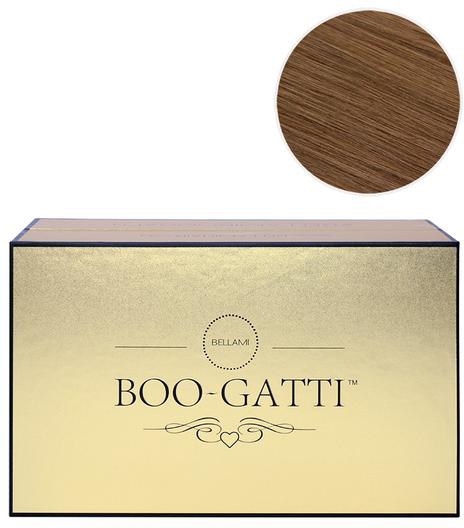 Ett guldfärgat box med svarta kanter och ett hjärta i designen, samt en cirkel med trätextur.