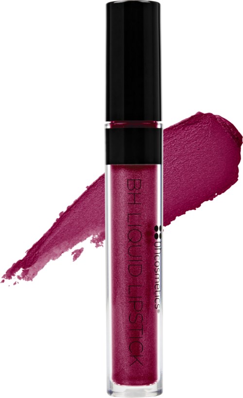 Ett läppglansrör med rosa färg och svart lock, hade en swatch av rosa läppstift bakom.