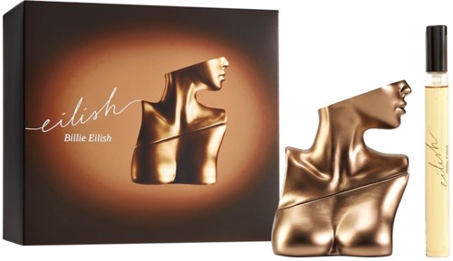 A perfume bottle shaped like a woman’s bust, with a gold finish, next to its packaging box.
