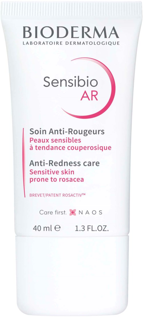 A white tube of skincare product from Bioderma, labeled for sensitive, redness-prone skin, with pink and black text.