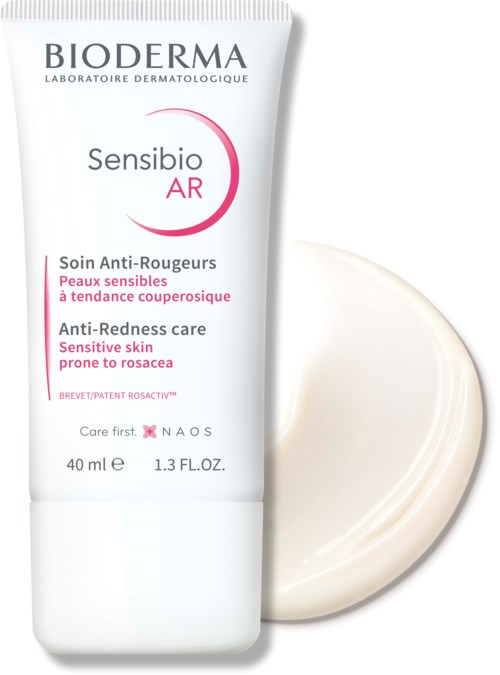 A white tube of Bioderma Sensibio AR cream with a cream swatch beside it for sensitive skin prone to redness.