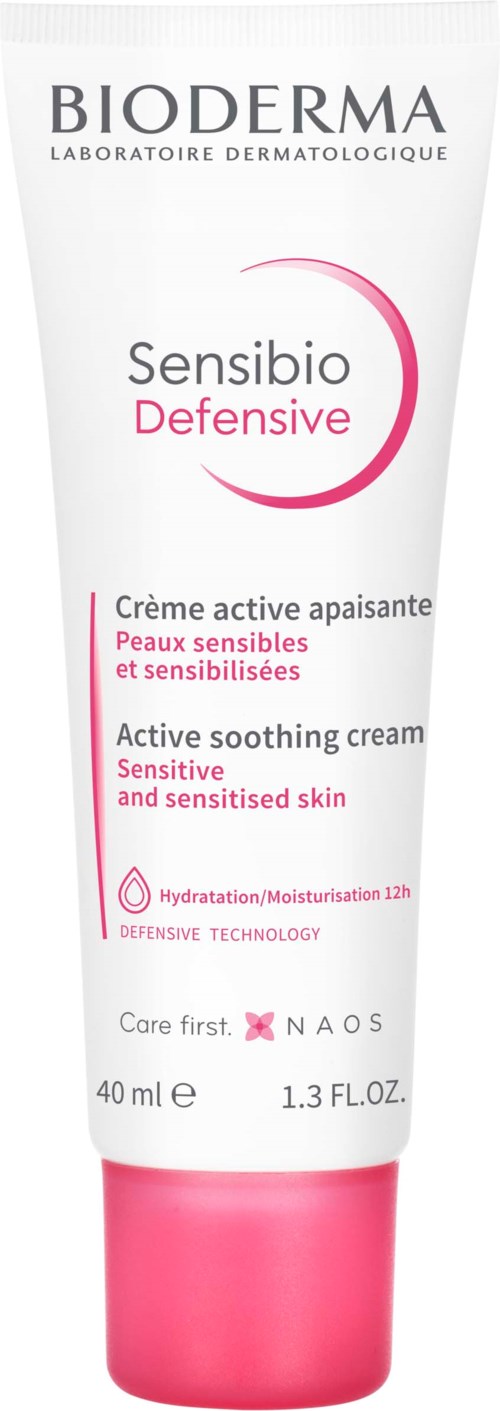 En vit och rosa tub med Bioderma Sensibio Defensive lugnande kräm för känslig hud. Den nämner hydrering och varsam vård.