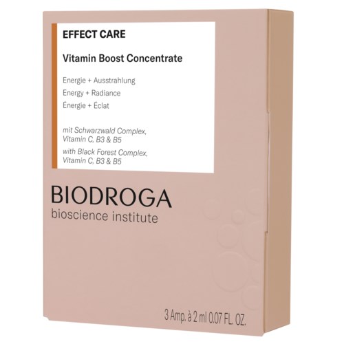 En rosa box märkt 'Effect Care' innehåller Vitamin Boost Concentrate för energi och lyster, med ingredienser som Black Forest Complex.