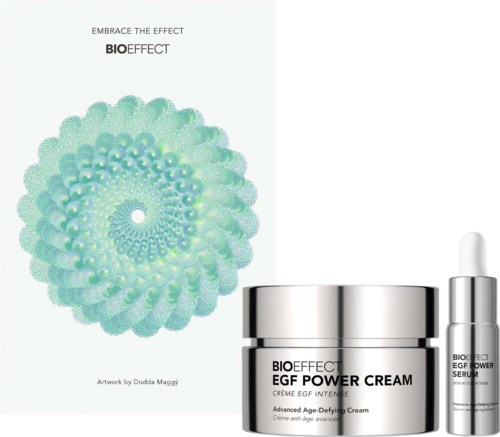 A skincare set with a jar of cream and a small serum bottle, plus a colorful abstract circle design and text.