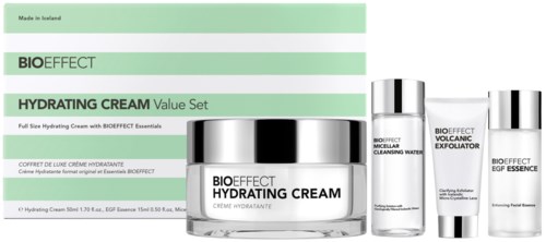 En hudplejesæt med creme, rensemiddel, detox og eksfolieringsprodukter i elegante beholdere og emballage.