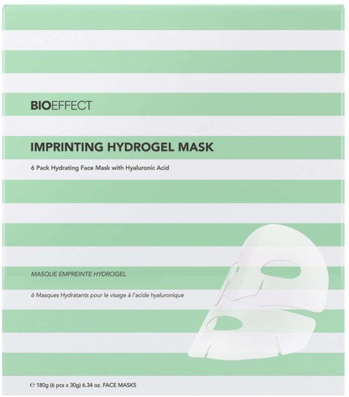 Grön och vit förpackning för ansiktsmask med text och bild av en ansiktsmask.