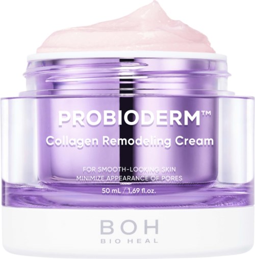 A purple jar of PROBIODERM Collagen Remodeling Cream with pink cream visible on top.
