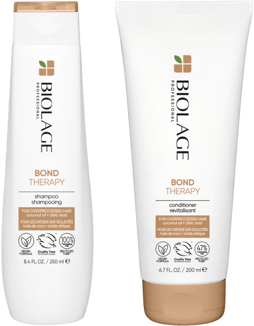 Two hair care products from Biolage Bond Therapy: one shampoo and one conditioner, designed for damaged hair.