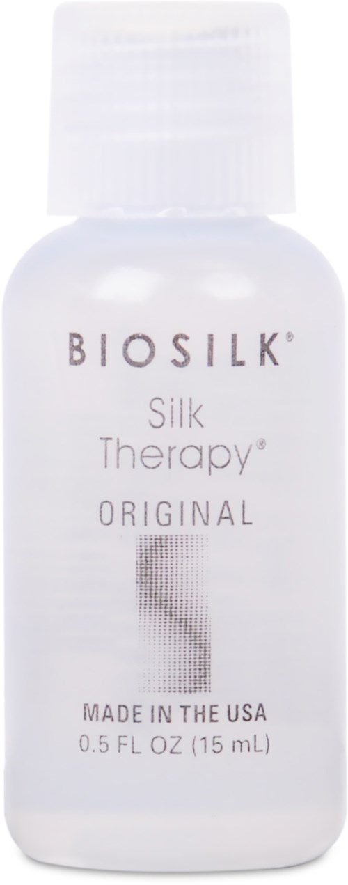 En vit flaska med BIOSILK Silk Therapy Original hårbehandling, tillverkad i USA, 0,5 fl oz.