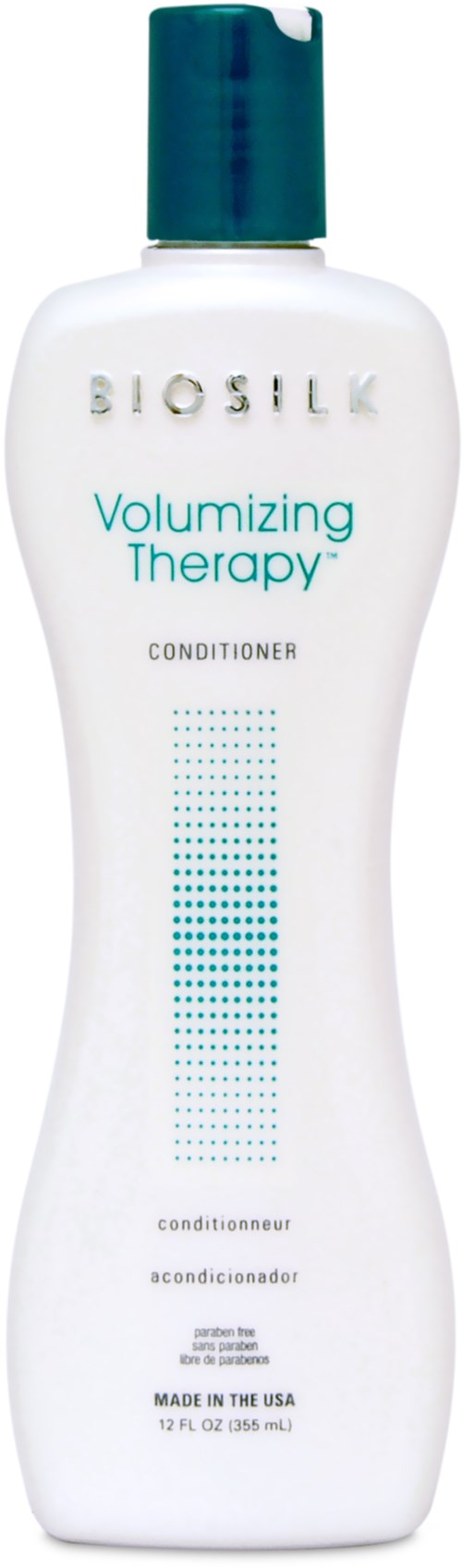En vit flaska med grön topp, märkt Biosilk Volumizing Therapy Conditioner. Den är lång och smal med blå text.