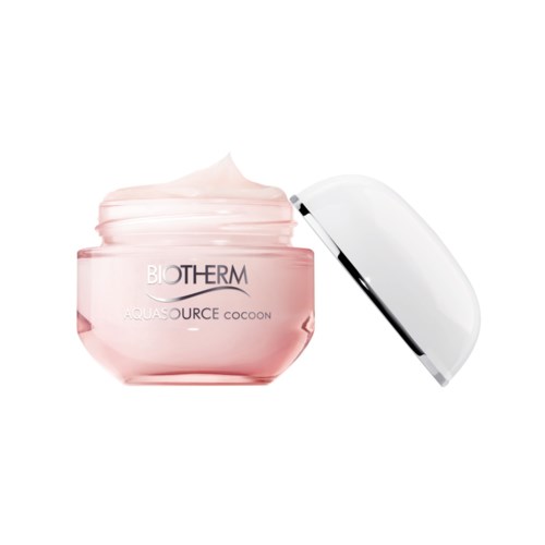 Ett rosa ställ med Biotherm Aquasource Cocoon dagkräm och ett vitt lock öppet, som visar krämen inuti.