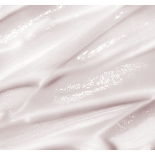 Soft white fabric with a smooth, shiny surface and gentle folds.