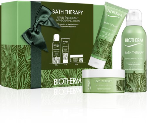 Ett hudvårdsset med grön förpackning som inkluderar gel, kräm, spray och box, märkt 'Bath Therapy' med naturlig design.