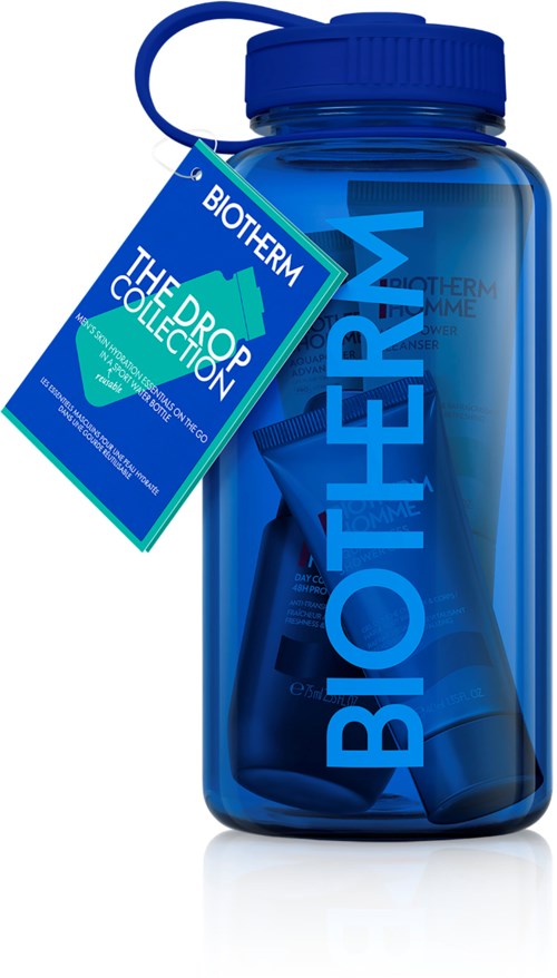 A large blue bottle with a label and a tag showing 'Biotherm' and 'The Dore Collection'.