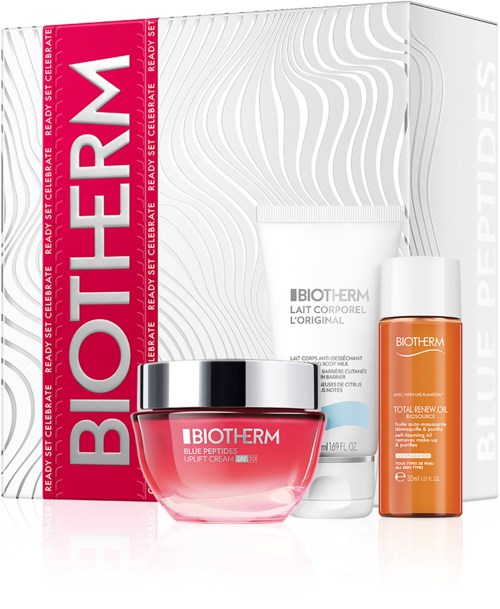 Et hudpleiesett som inkluderer en rosa kremkrukke, hvite og oransje flasker, og en hvit eske med BIOTHERM-logoen.