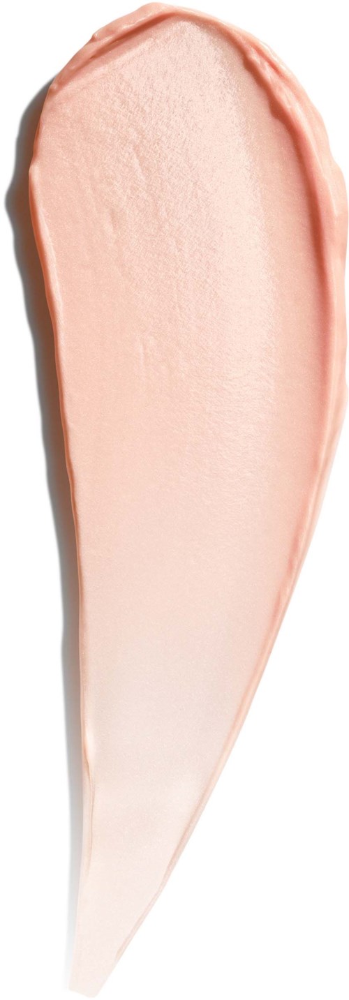 A smear of light pink cream with a smooth texture and curved shape.