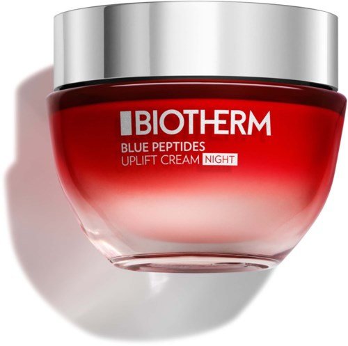 Röd burk med Biotherm Blue Peptides Uplift Cream Night och silverlock.
