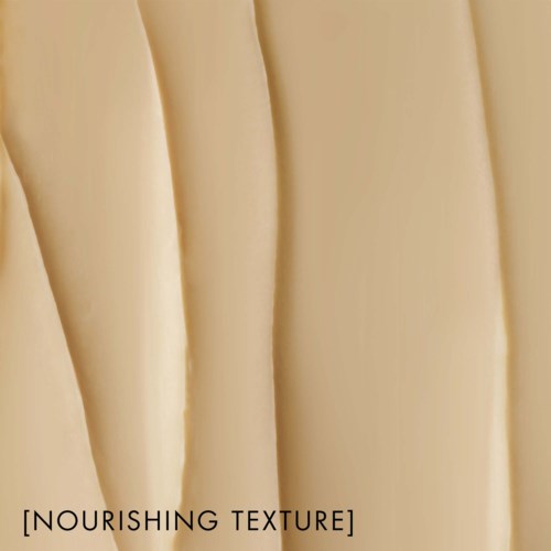 Närbild av enslät, krämig skönhetsprodukt med etiketten nourishing texture.