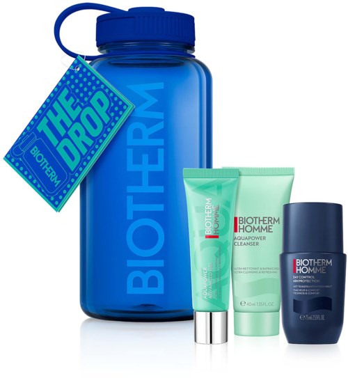 Biotherm Homme hudvårdsset med en stor blå flaska och tre mindre tuber eller stift framför.