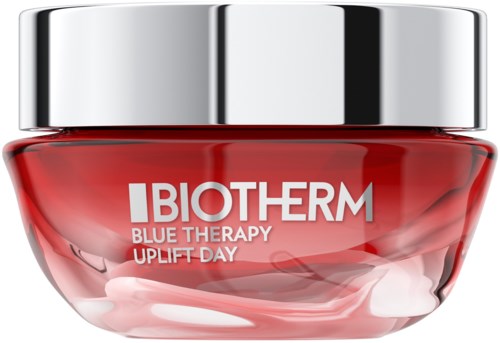 A jar of Biotherm Blue Therapy skincare product with a silver lid and red container.