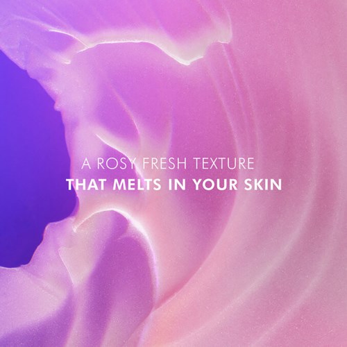 Text about a skincare product with a soft, pink background and white text.