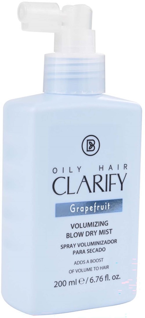 En lys blå sprayflaske mærket Clarify Grapefruit, designet til fedtet hår for at give volumen og fugt.