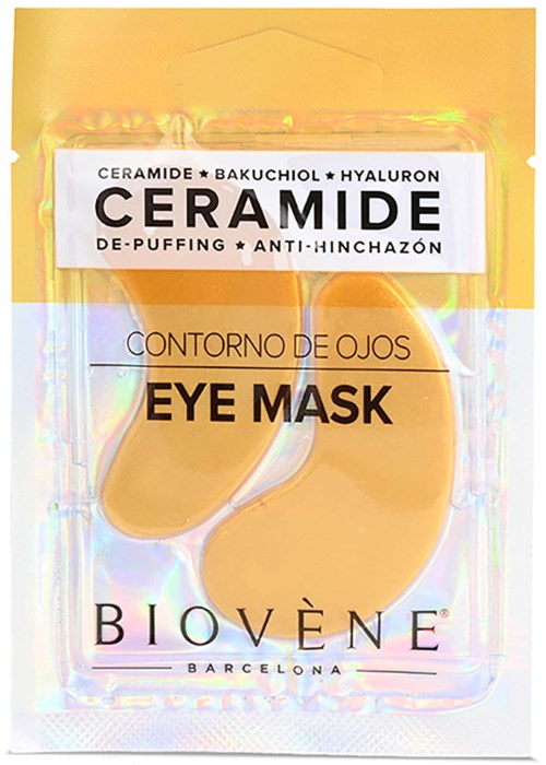 En pakke med øjenmasker mærket 'Ceramide' til at mindske hævelse og hævelsessymptomer. Indeholder to gule, ovale masker.