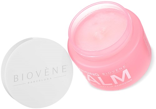 En pink krukke med hudplejecreme og hvid låg mærket Biovène. En smule creme er synlig indeni.