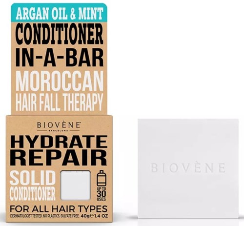 En box märkt 'Biovène Hydrate Repair Solid Conditioner' med text om arganolja, mint, marockansk behandling och hårvård.
