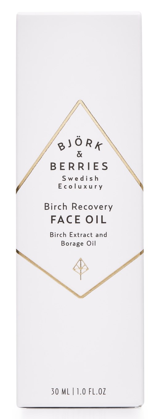 En vit låda med svart och guld text beskriver Björk & Berries Swedish Ecoluxury Birch Recovery Face Oil.