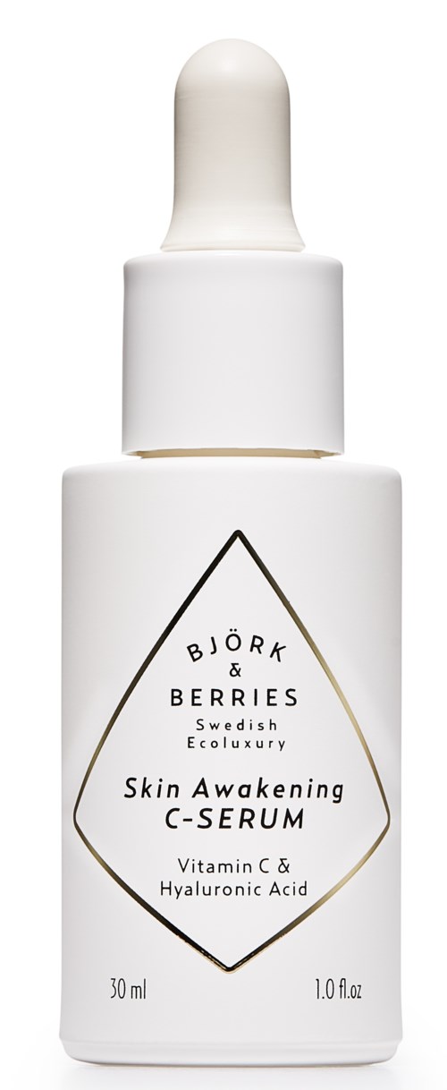 Hvit dråpeflaske med hudpleieserum med etikett som leser Björk & Berries, Skin Awakening C-Serum, Vitamin C, Hyaluronsyre, 30 ml.