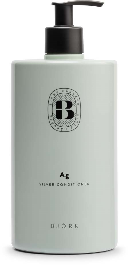 A white bottle with a black pump labeled Bjork Silver Conditioner, with a logo and text.