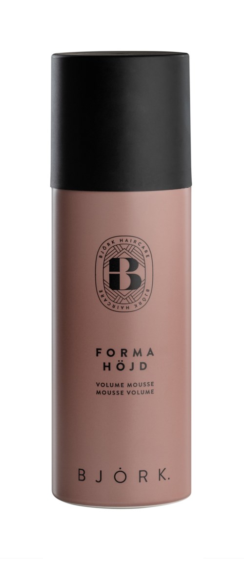 En rosa flaske med svart hette, merket Björk Forma Höjd volumemousse for hår styling.