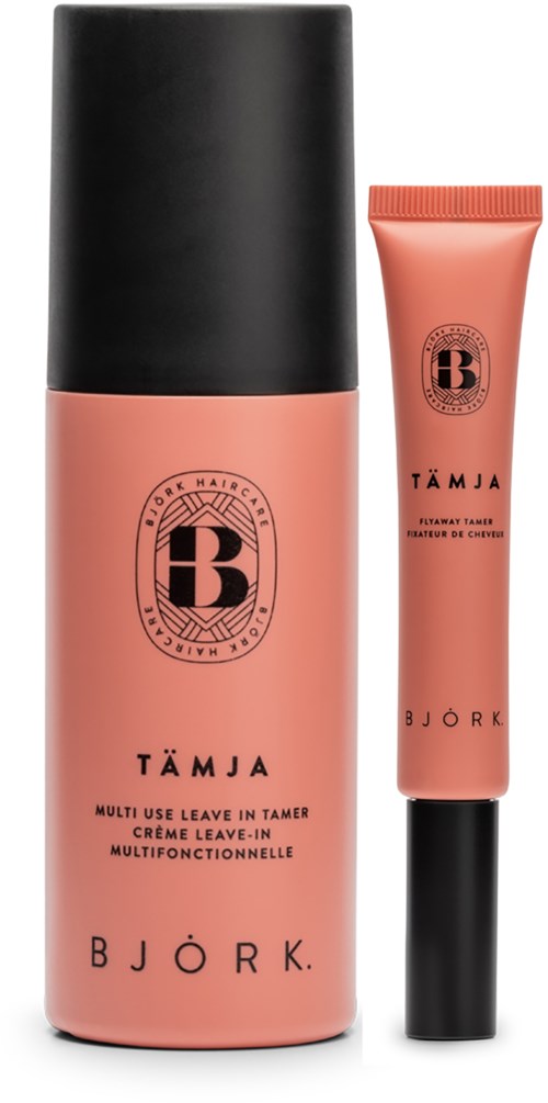 To rosa beholdere av Björk Tämja leave-in hårbehandling, en lang flaske og en mindre tube.