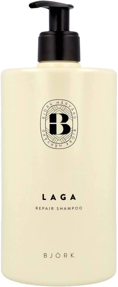 En beige shampoo-flaske med sort pumpe, med sort og hvid tekst og logo.