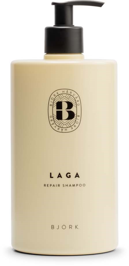 Een beige fles met een zwarte pomp, gelabeld 'LAGA Repair Shampoo' door Bjork.