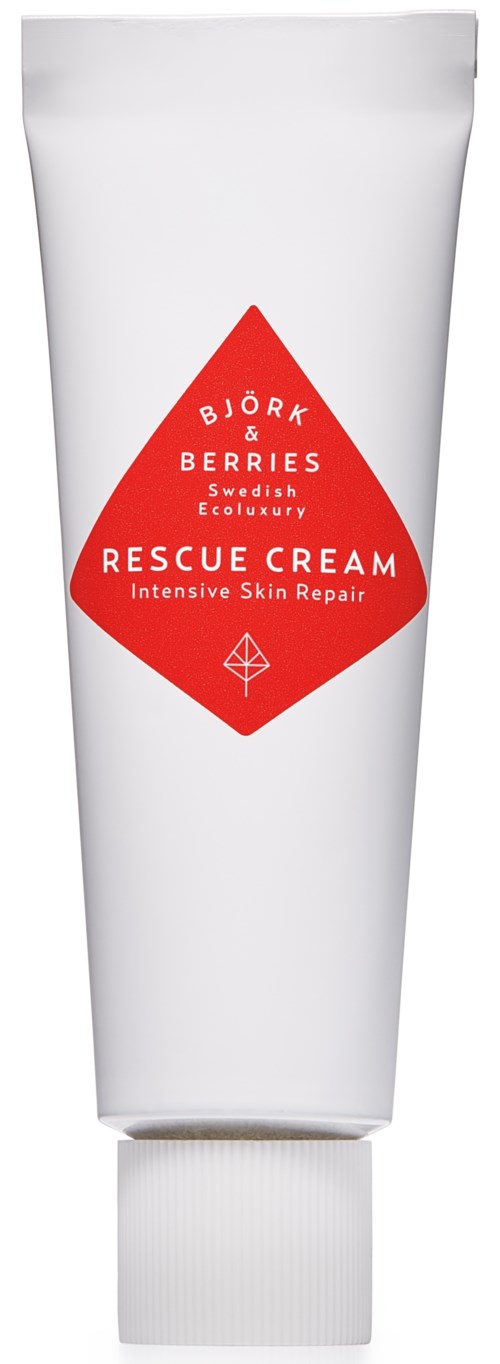 En vit tub med en röd diamantform i mitten, märkt 'Bjork & Berries Rescue Cream'.