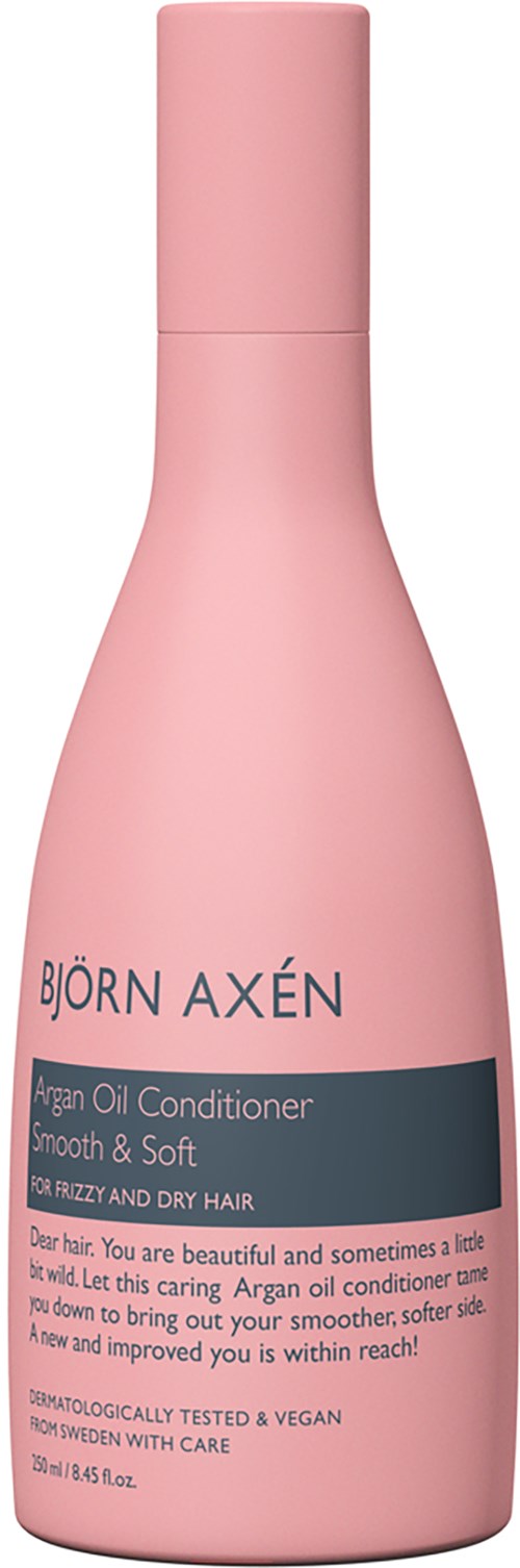 Pink bottle of Björn Axén argan oil conditioner for smooth, soft, and dry hair.