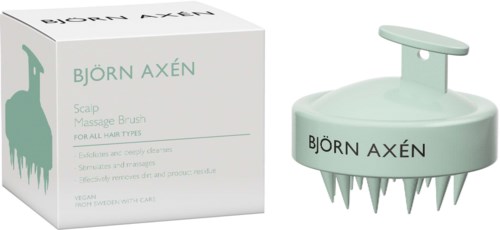 En hodebunnsmassasje fra Björn Axén i lys grønn farge, med en hvit eske som viste produktinformasjon.