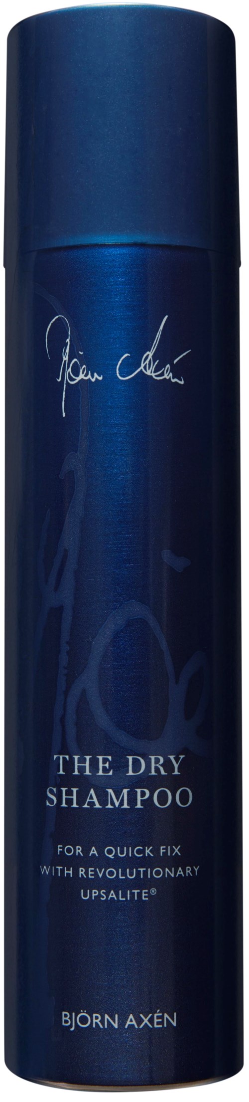 En lång blå burk märkt 'The Dry Shampoo' med vit text, avsedd för snabb hårfräschör.