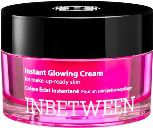 Rosa burk märkt 'Instant Glowing Cream' med svart lock, varumärket 'INBETWEEN' längst ner.